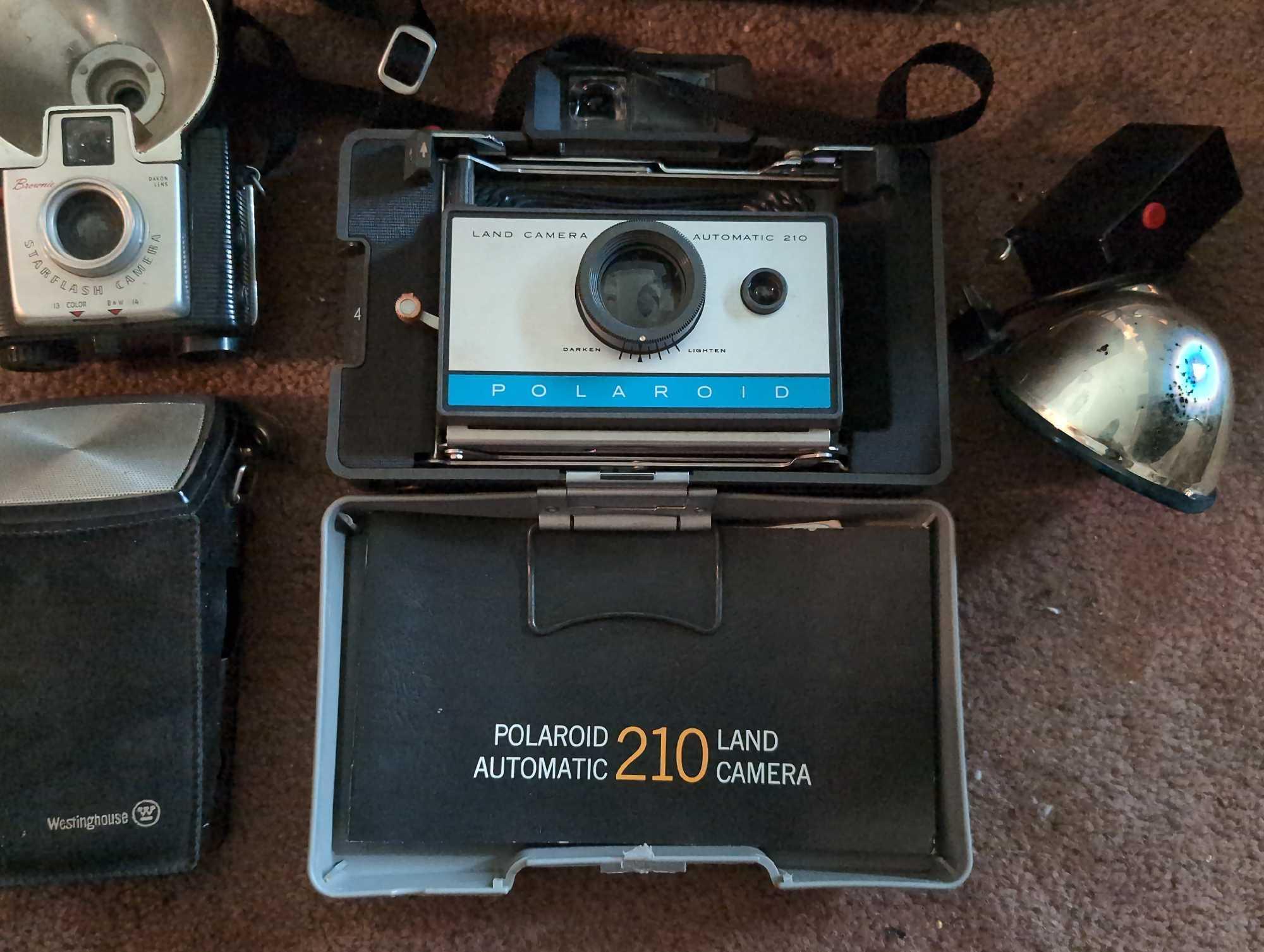 (LR) LOT TO INCLUDE: POLAROID 210 LAND CAMERA WITH CARRYING CASE, WESTINGHOUSE RADIO, BROWNIE