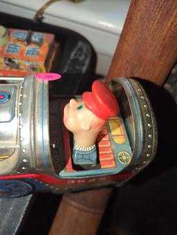 (LR)BATTERY OPERATED TIN TOY, SILVER MOUNTAIN LOCOMOTIVE WITH OPERATOR, UNTESTED, IN GOOD CONDITION.