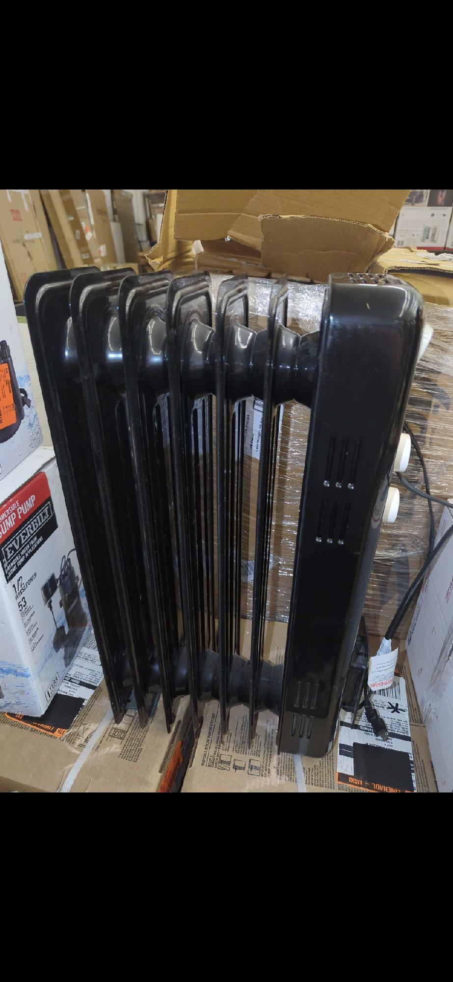 Pelonis 1,500-Watt Oil-Filled Radiant Electric Space Heater with Thermostat, Retail Price $55,