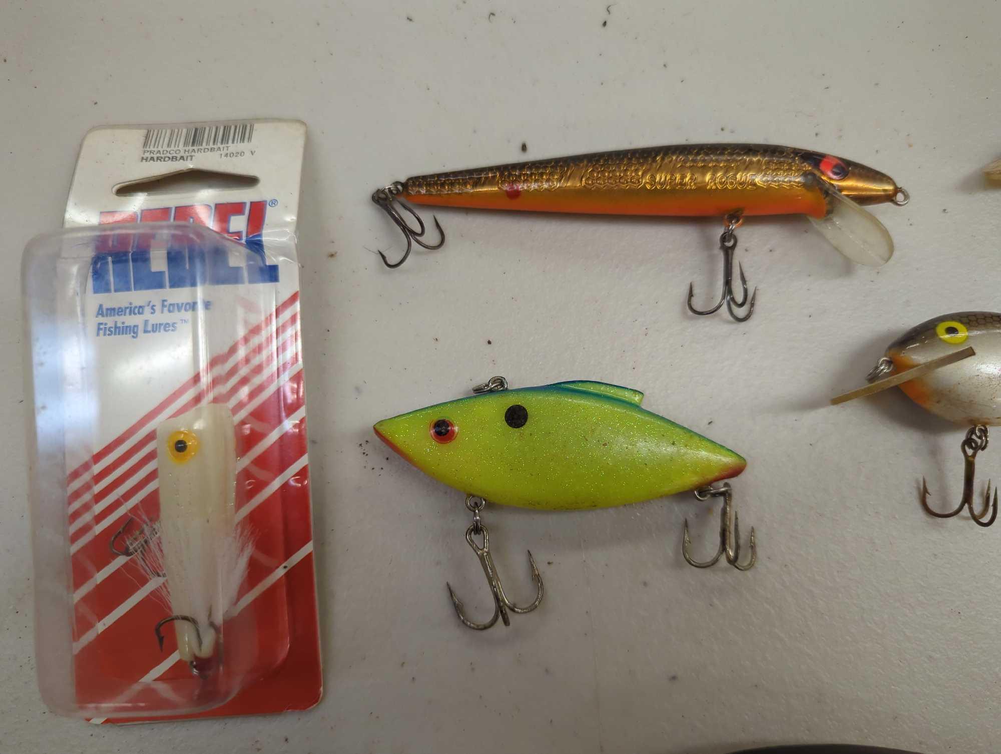 Tackle Box and contents including various fishing lures of similar style. Comes as is shown in