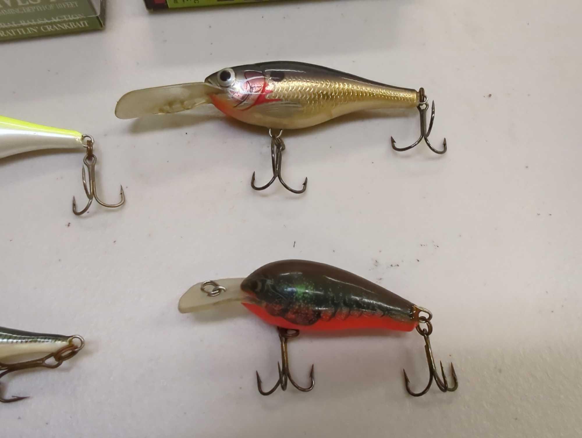 Tackle Box and contents including various fishing lures of similar style. Comes as is shown in