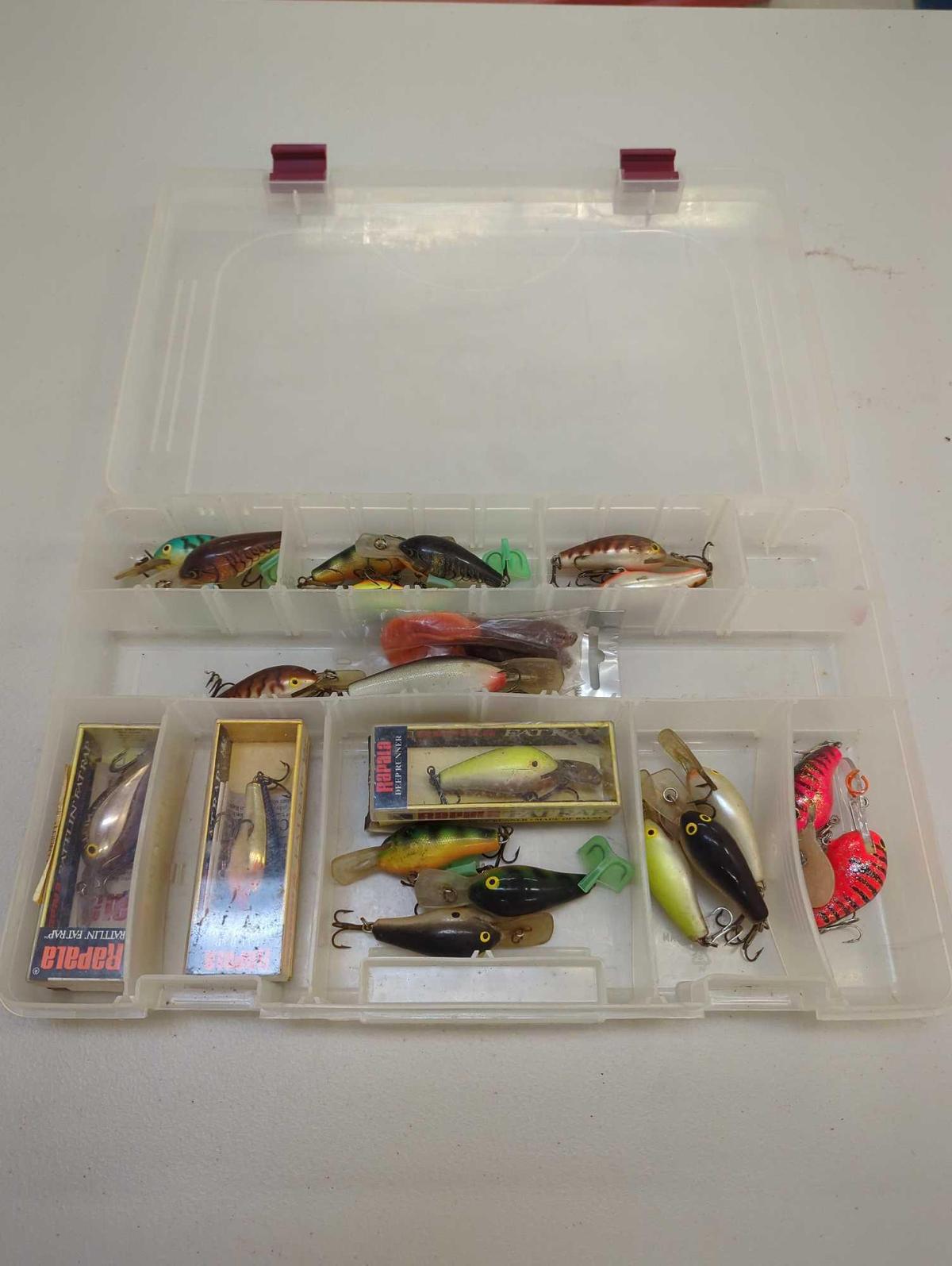 Tackle Box and contents including various fishing lures of similar style. Comes as is shown in