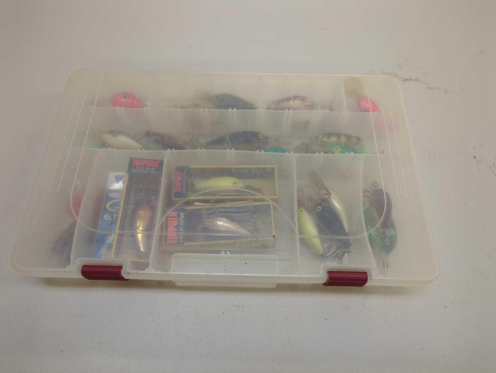 Tackle Box and contents including various fishing lures of similar style. Comes as is shown in