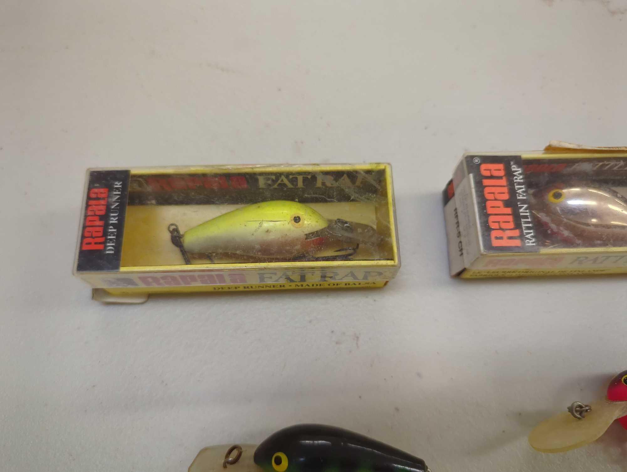 Tackle Box and contents including various fishing lures of similar style. Comes as is shown in