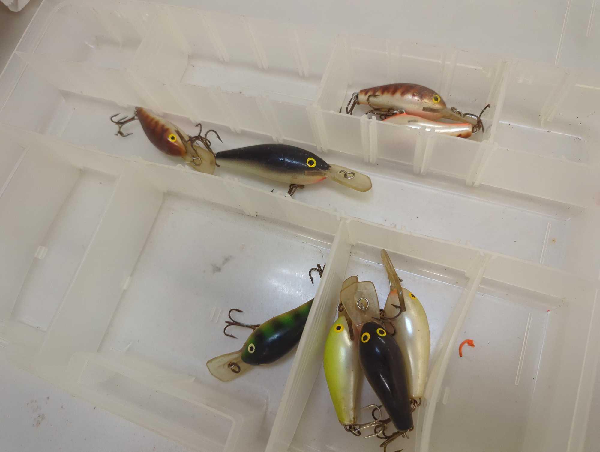 Tackle Box and contents including various fishing lures of similar style. Comes as is shown in