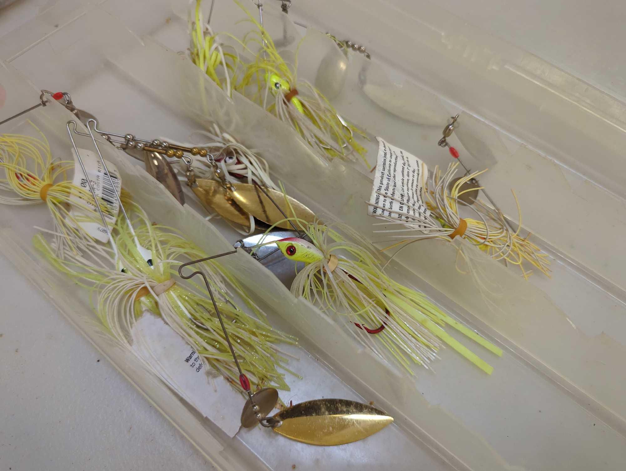 Tackle Box and contents including various fishing lures of similar style. Comes as is shown in