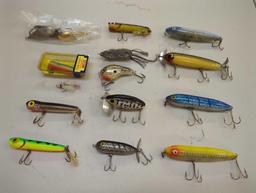 Tackle Box and contents including various fishing lures of similar style. Comes as is shown in