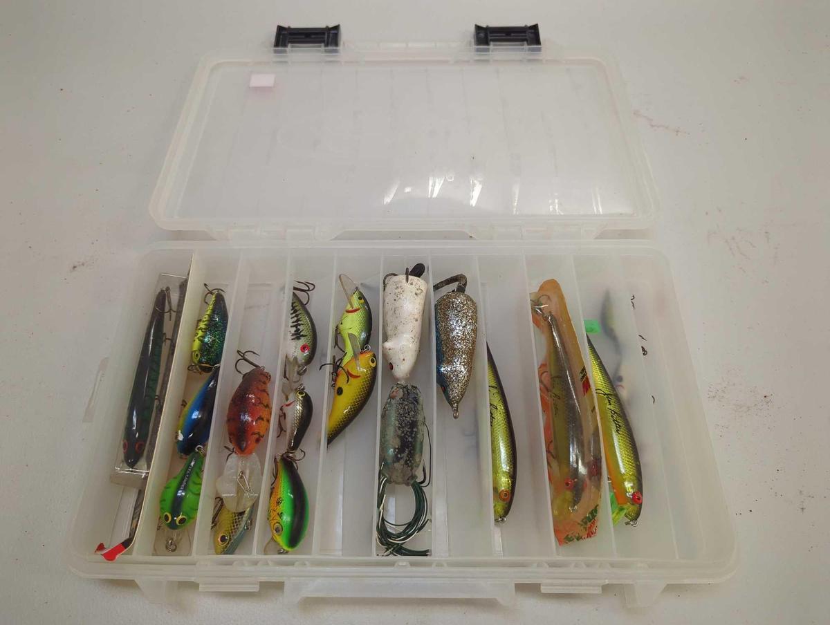 Tackle Box and contents including various fishing lures of similar style. Comes as is shown in