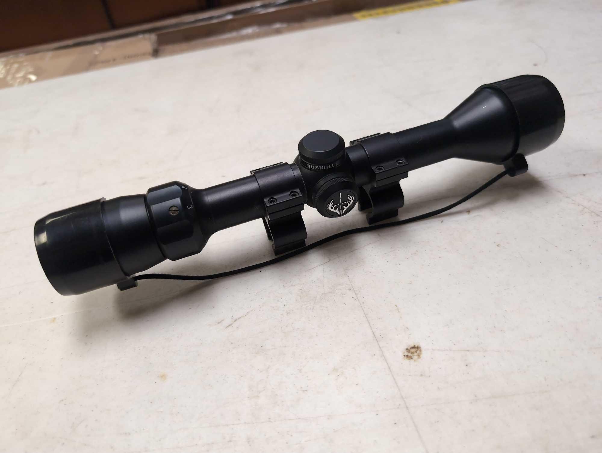 BUSHNELL 3-9X40 RIFLE SCOPE WITH MOUNTING BRACKETS - MODEL #73-3948, SERIAL #AO11656. COMES WITH