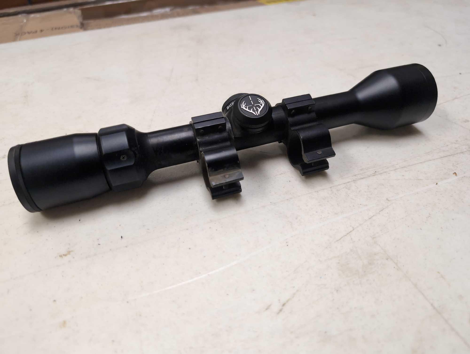 BUSHNELL 3-9X40 RIFLE SCOPE WITH MOUNTING BRACKETS - MODEL #73-3948, SERIAL #AO11656. COMES WITH