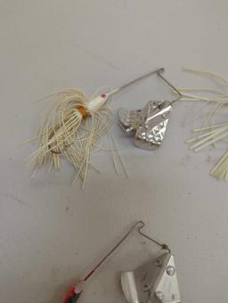 Tackle Box and contents including various fishing lures of similar style. Comes as is shown in