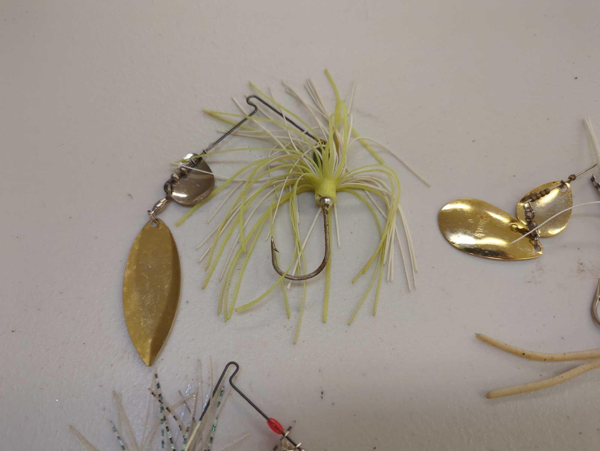 Tackle Box and contents including various fishing lures of similar style. Comes as is shown in