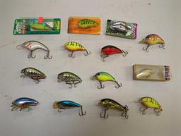 Tackle Box and contents including various fishing lures of similar style. Comes as is shown in