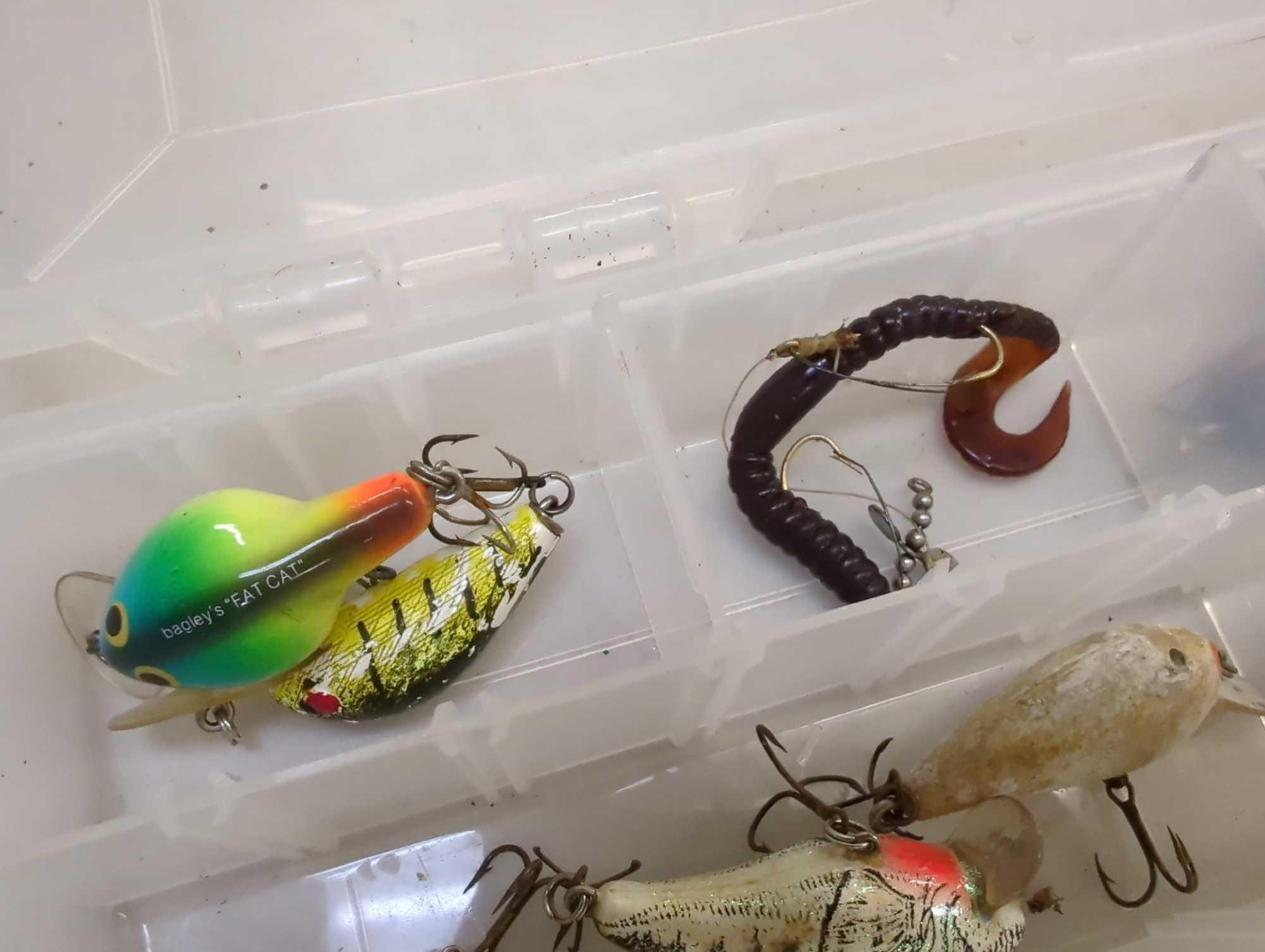 Tackle box and contents including various fishing. Lures. Comes as is shown in photos. Appears to be