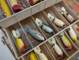 Large tackle box and contents including various fishing lures of similar style. Comes as is shown in