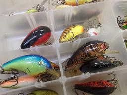 Tackle Box and contents includes fishing lures of similar style. Comes as is shown in photos.