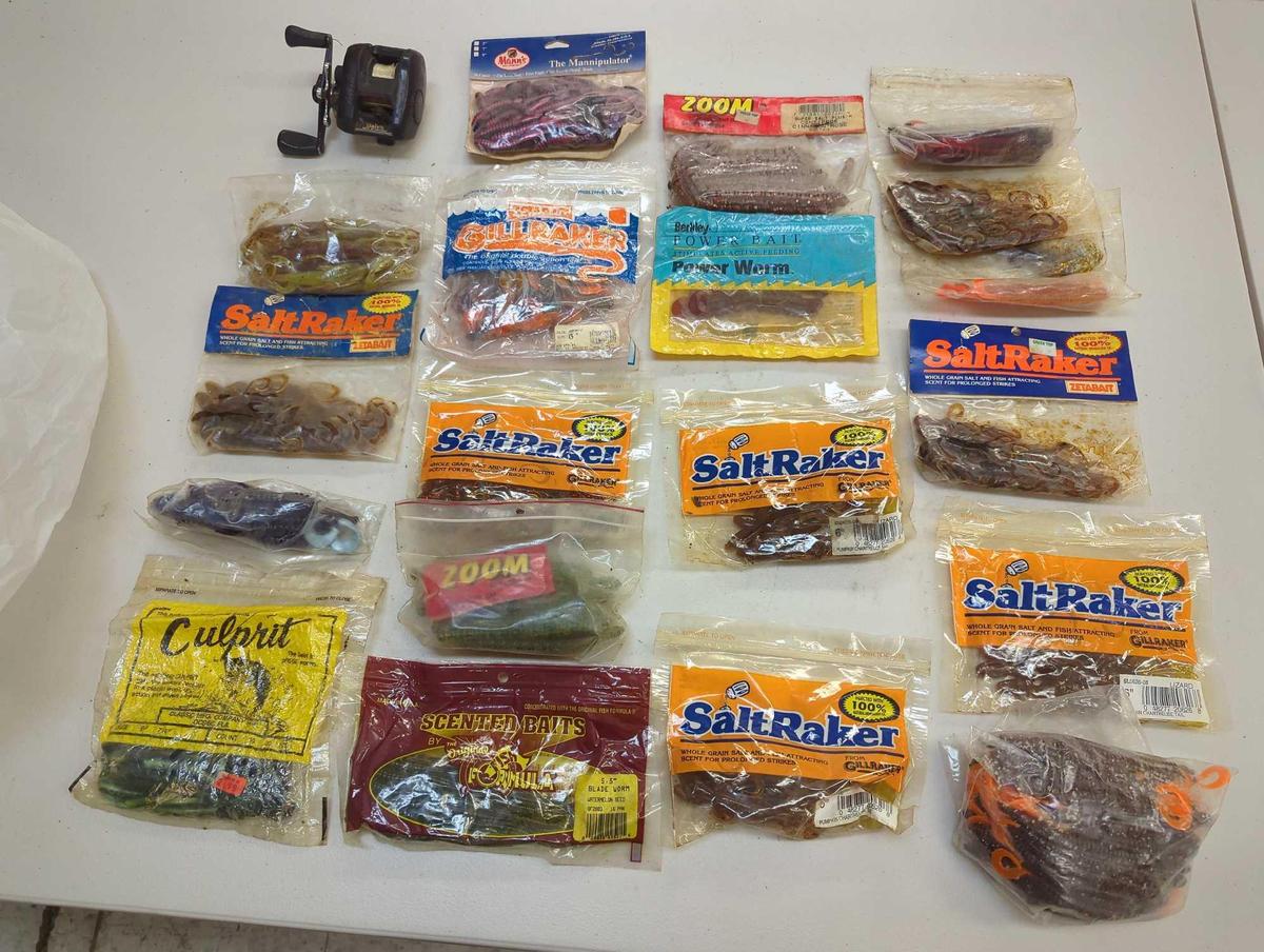 Bag of fishing worm lures and fishing reel. Comes as is shown in photos. Appears to be used.