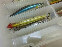 2 small tackle boxes containing fishing lures of similar style. Comes as is shown in photos. Appears