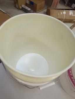 Lot of 4 white 5 Gallon buckets. Comes as is shown in photos. Appears to be used.