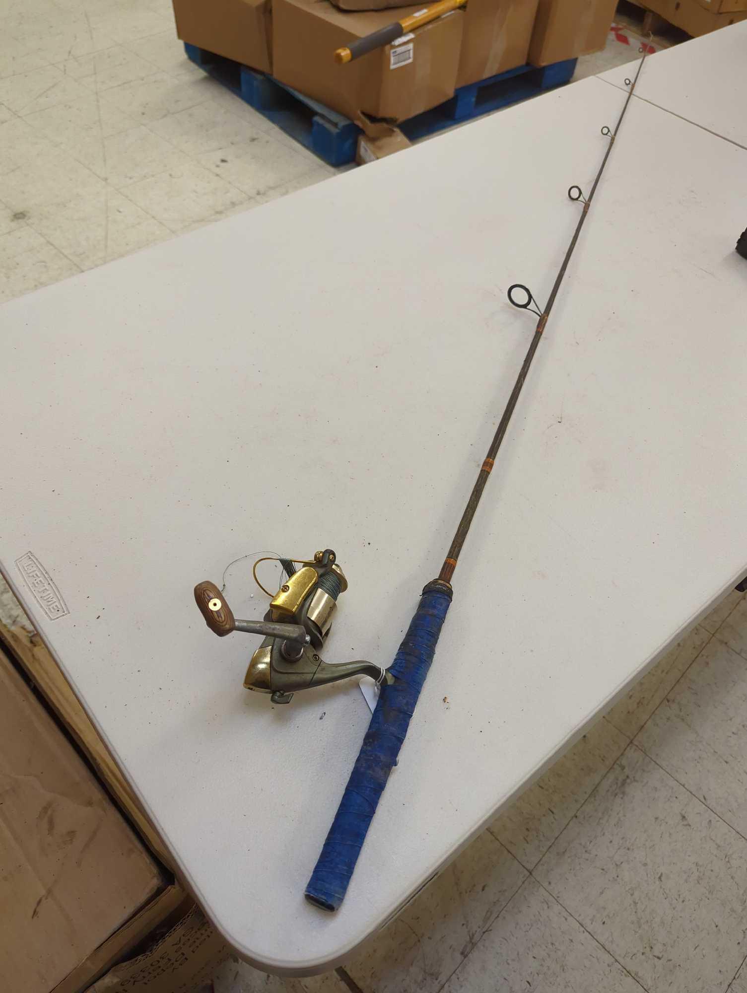 Brown 5'2" fishing rod with spinning reel. Comes as is shown in photos. Appears to be used.