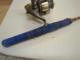 Brown 5'2" fishing rod with spinning reel. Comes as is shown in photos. Appears to be used.