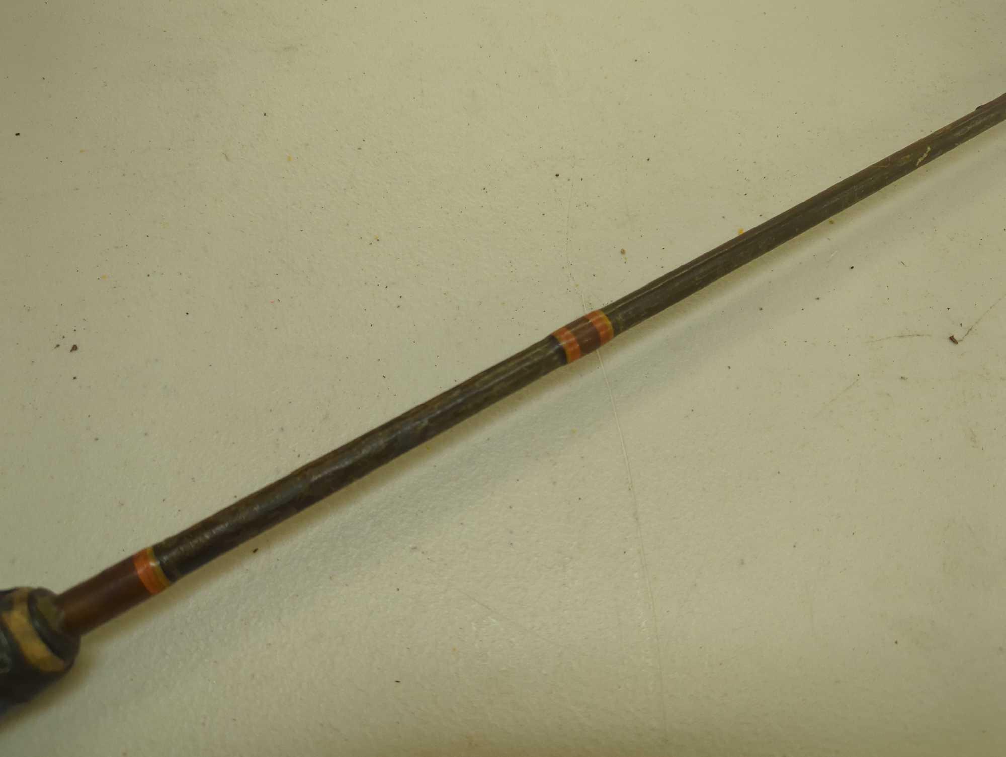 Brown 5'2" fishing rod with spinning reel. Comes as is shown in photos. Appears to be used.