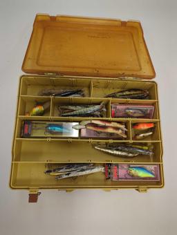 Dual-sided Tackle Box and contents including various fishing lures. Comes as is shown in photos.