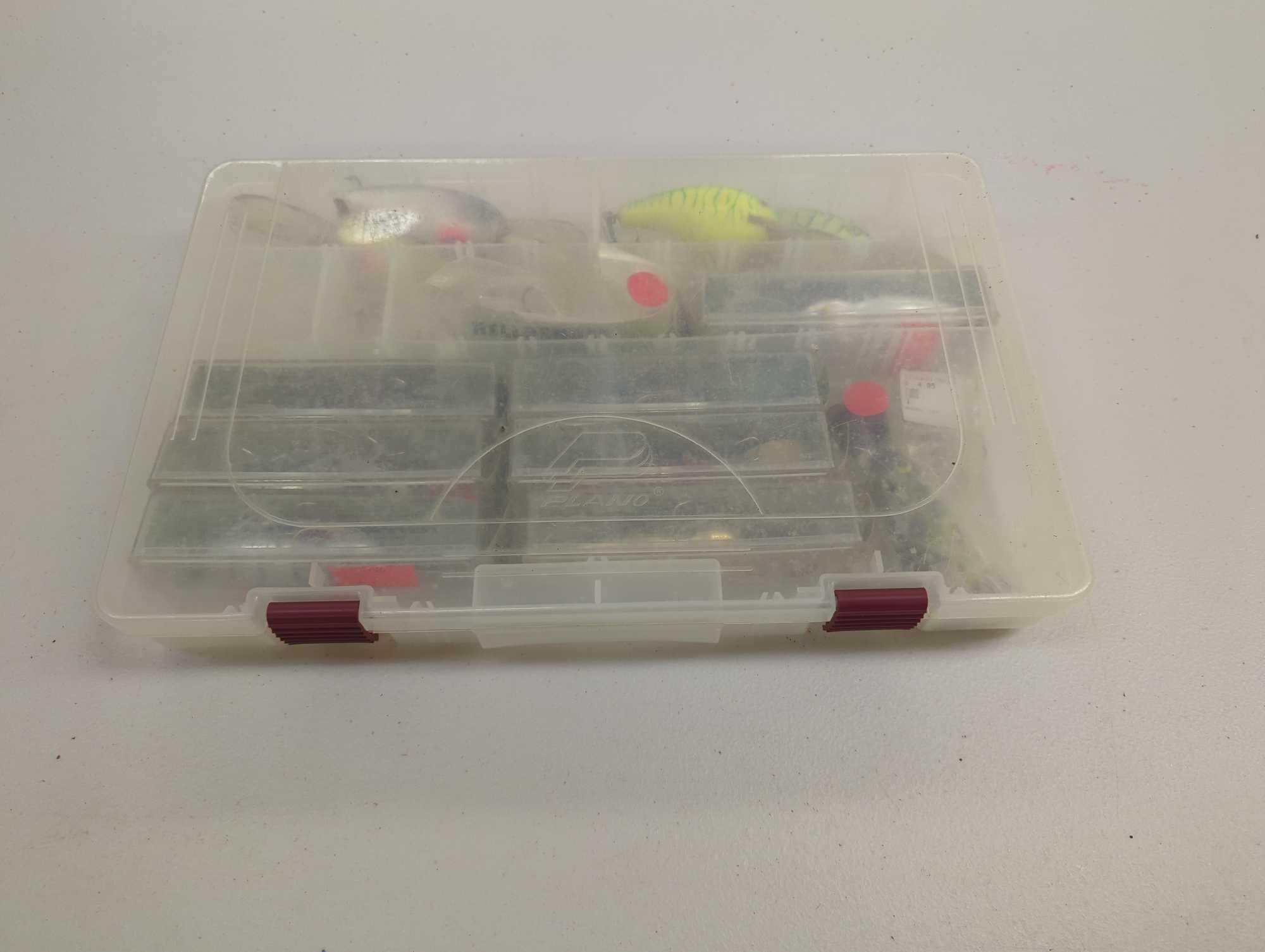 Tackle Box and contents including various fishing lures of similar style. Comes as is shown in