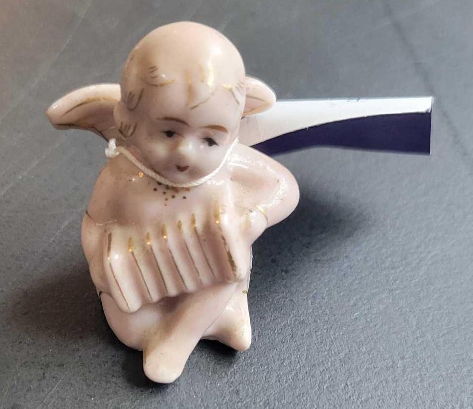 Cherub Figure $1 STS