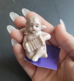 Cherub Figure $1 STS