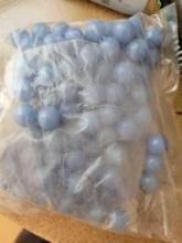 A Bag of Blue Marbles and Three Containers Of Glow Stick Bracelets. $1 STS