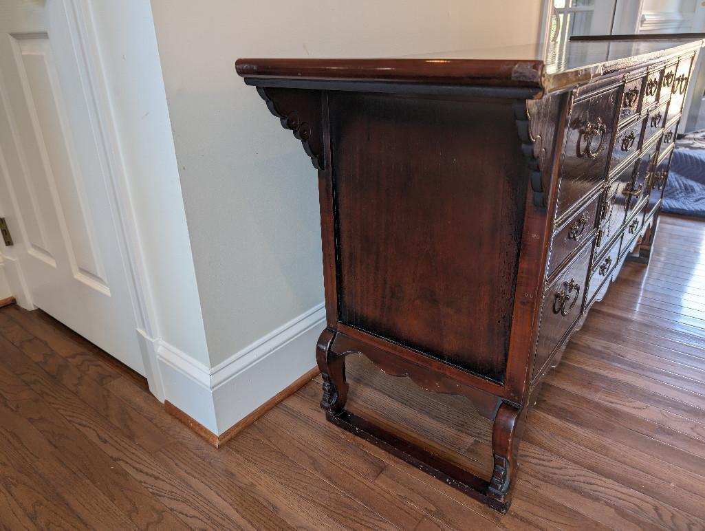 KOREAN BRASS ACCENTED BUFFET/SIDEBOARD. FEATURES MULTIPLE DRAWERS AND SINGLE CABINET.