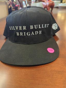 SILVER BULLET BRIGADE NRA HAT, BLACK WOTH WHITE FONT. CHARLESTON HESTON