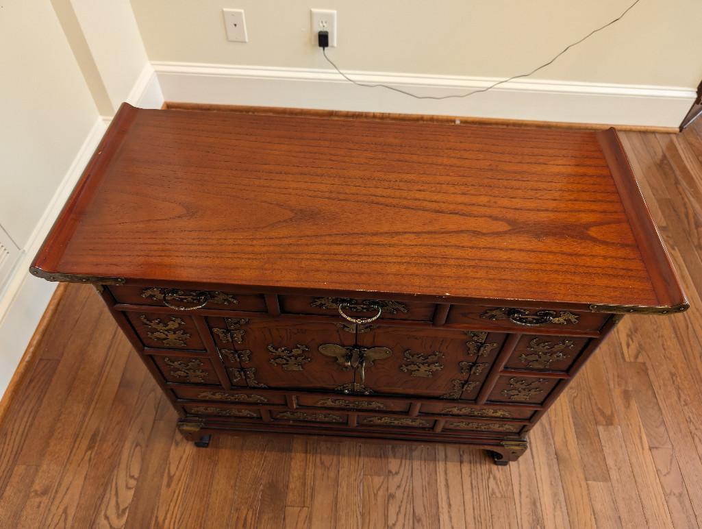 LATE 19TH CENTURY KOREAN BRASS ACCENTED TANSU CABINET. FEATURING MULTIPLE DRAWERS AND SINGLE