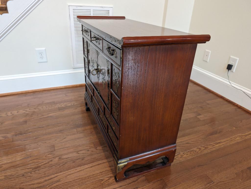 LATE 19TH CENTURY KOREAN BRASS ACCENTED TANSU CABINET. FEATURING MULTIPLE DRAWERS AND SINGLE