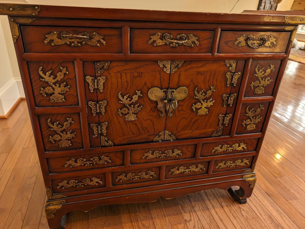 LATE 19TH CENTURY KOREAN BRASS ACCENTED TANSU CABINET. FEATURING MULTIPLE DRAWERS AND SINGLE