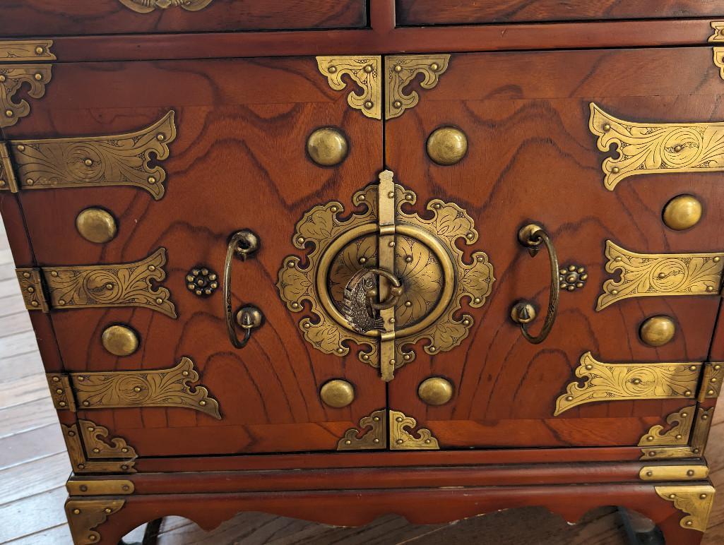 LATE 19TH CENTURY KOREAN BRASS ACCENTED SIDE TABLE/CABINET. FEATURES TWO DRAWERS AT THE TOP AND TWO