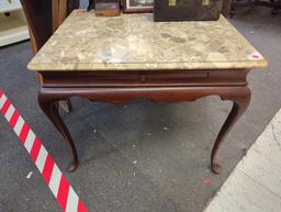 Marble top end table with extendable table top space drawer. Comes as a shown in photos. Appears to