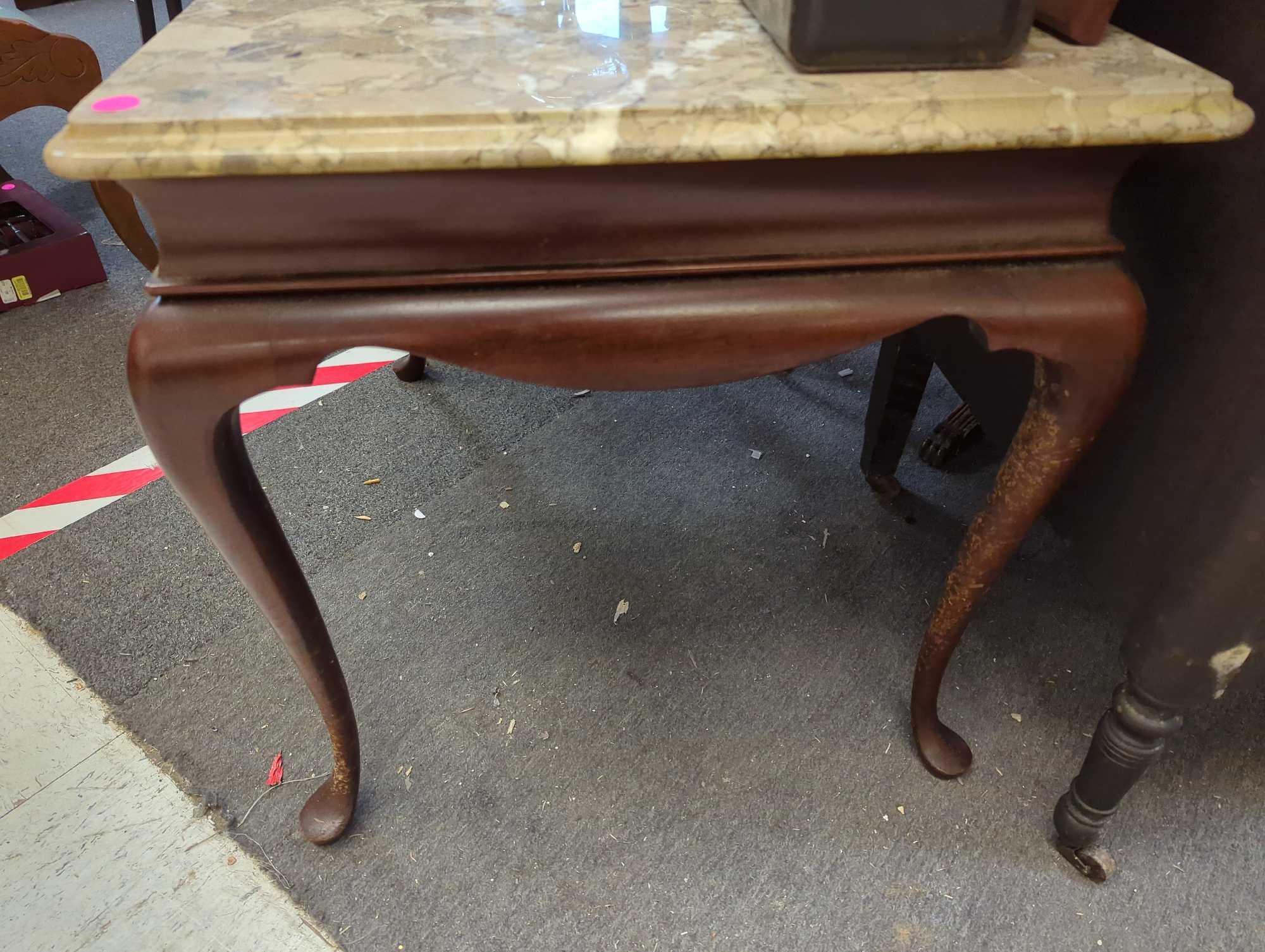 Marble top end table with extendable table top space drawer. Comes as a shown in photos. Appears to