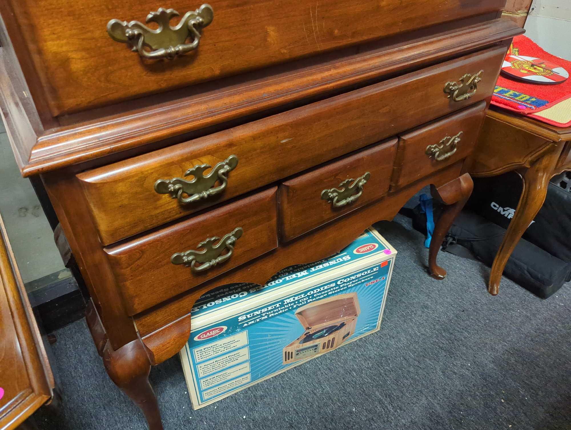 Vintage traditional wood highboy chest with 11 drawers. Comes as Shannon photos. Appears to be used.