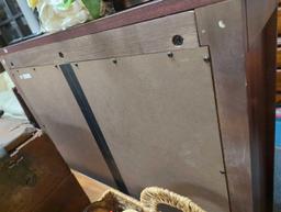 Three-shelf wooden bookcase. Comes as is shown in photos. Appears to be used. Surrounding items not