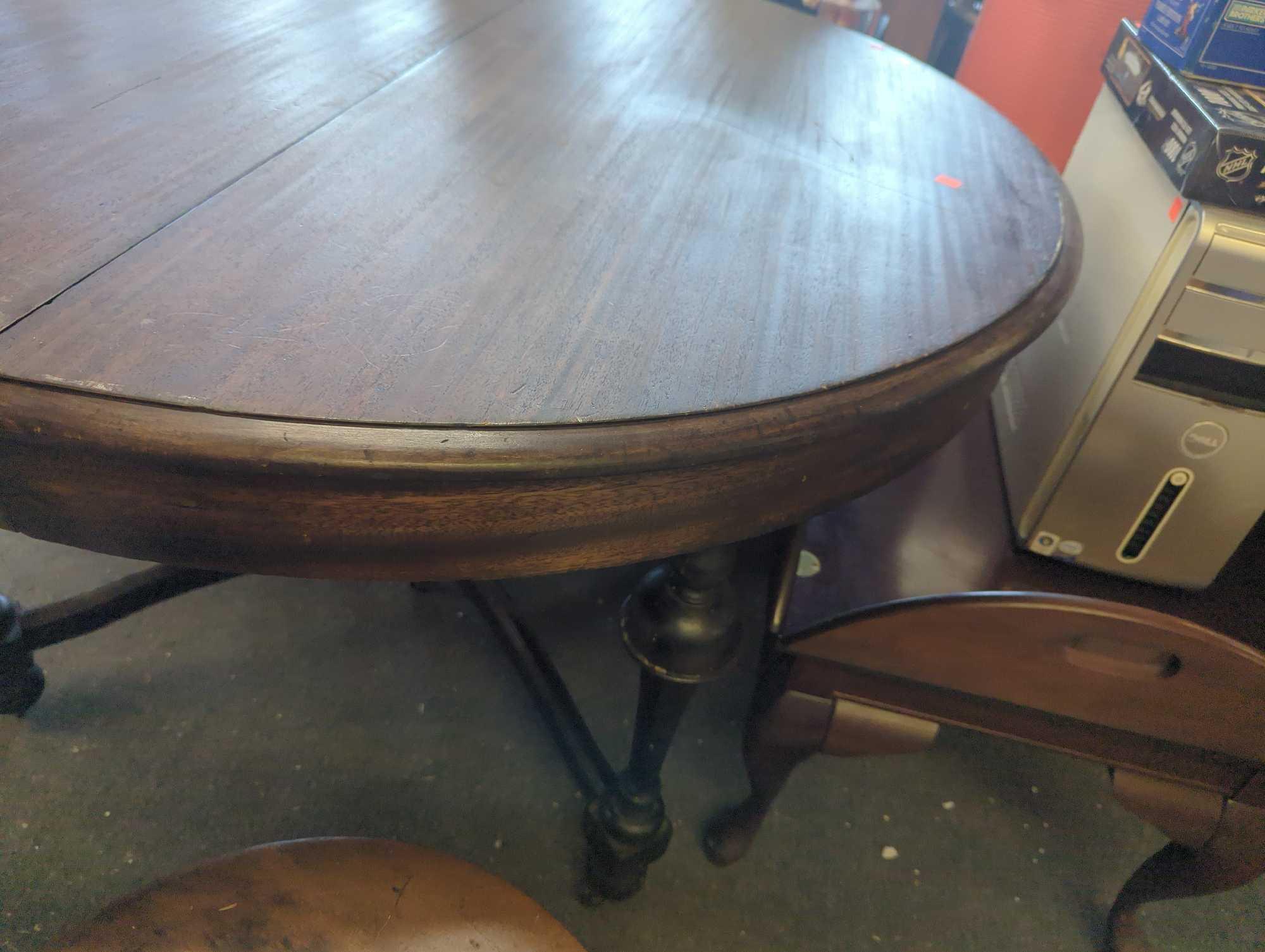 Old Style Mahogany Dining Table on Rollers, Approximate Dimensions - 29.5" H x 48" Diameter, Table