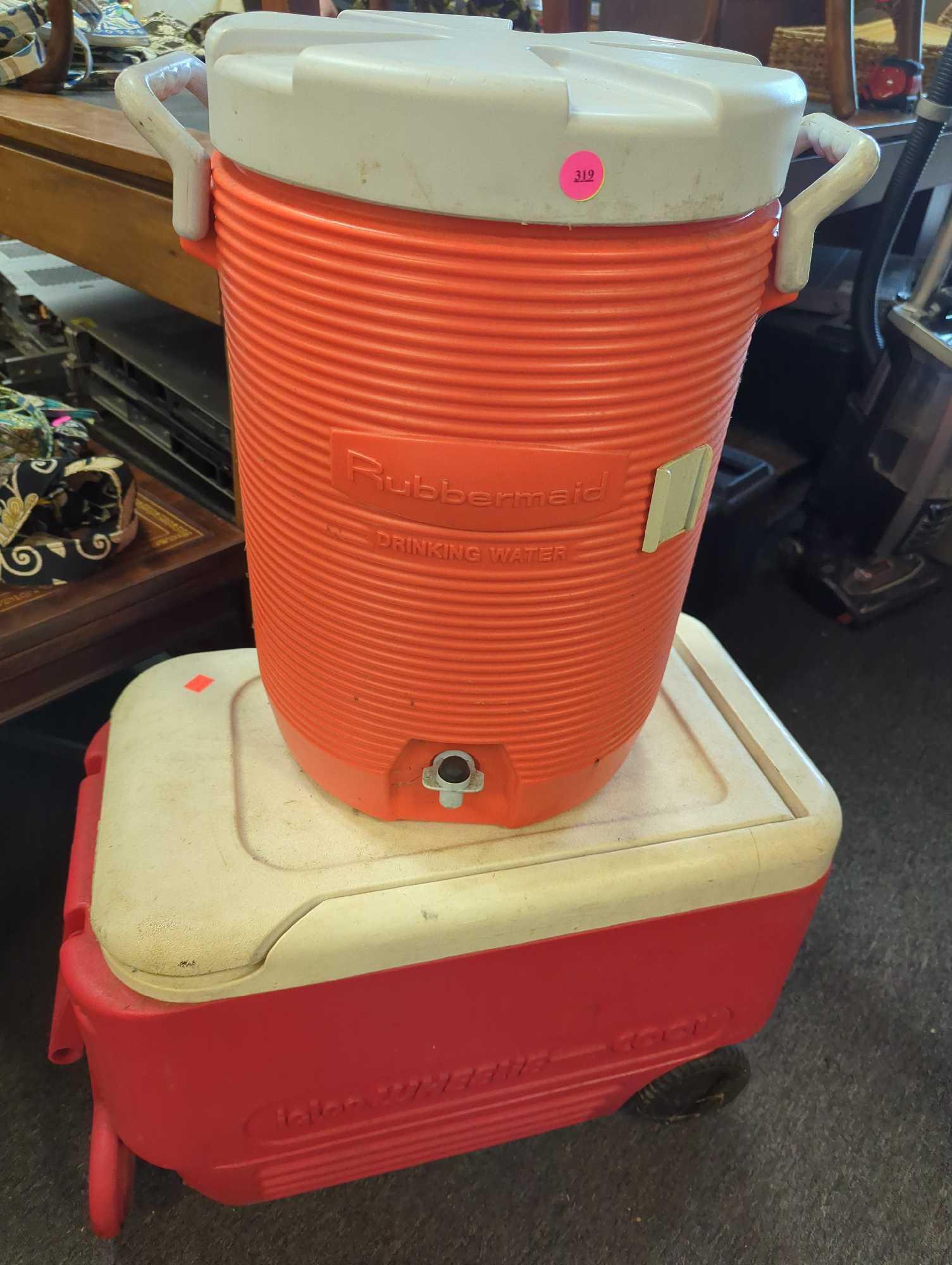 Lot of 2 Coolers In Assorted Styles To Include, Rubbermaid 3 Gallons Water Cooler Used, And 38 Quart