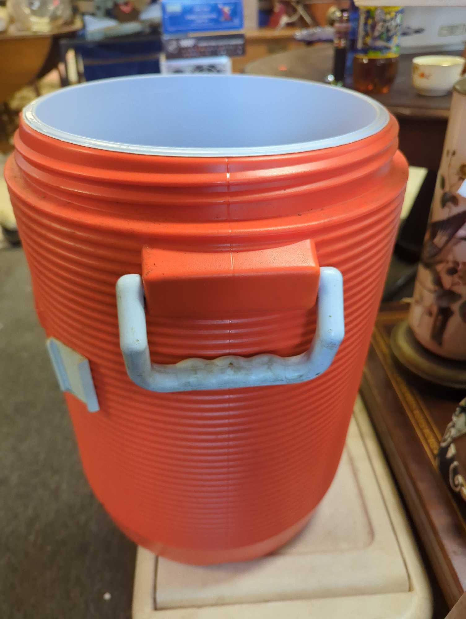 Lot of 2 Coolers In Assorted Styles To Include, Rubbermaid 3 Gallons Water Cooler Used, And 38 Quart