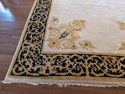 11'8" X 8' 8" HAND KNOTTED RUG. CREAM/YELLOW/BLACK.