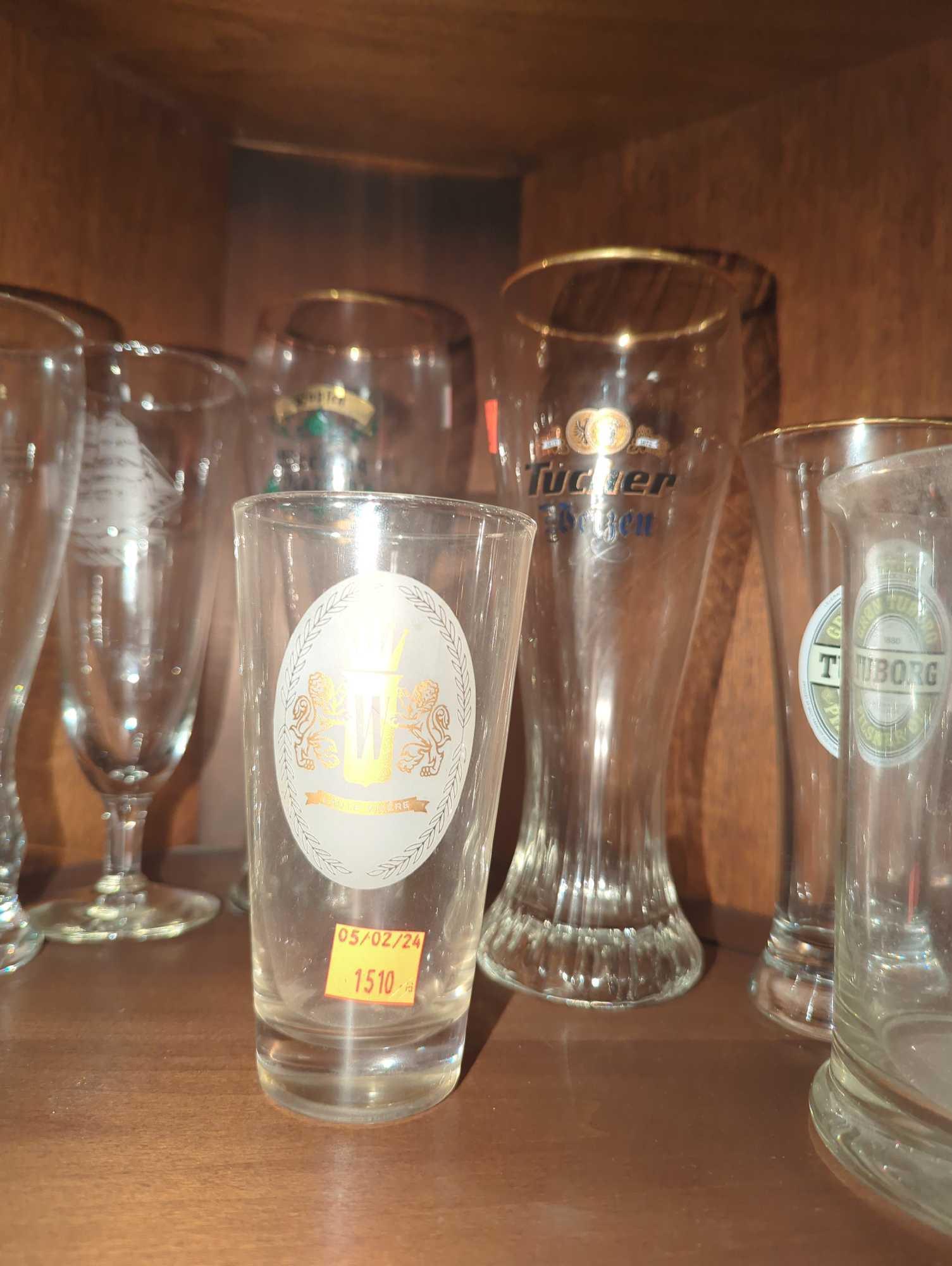 Shelf Lot of Assorted Glasses Including Wine Glasses, Beer Mugs, Tulip Glasses, Etc...What You See