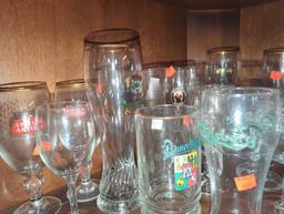 Shelf Lot of Assorted Glasses Including Wine Glasses, Beer Mugs, Tulip Glasses, Etc...What You See
