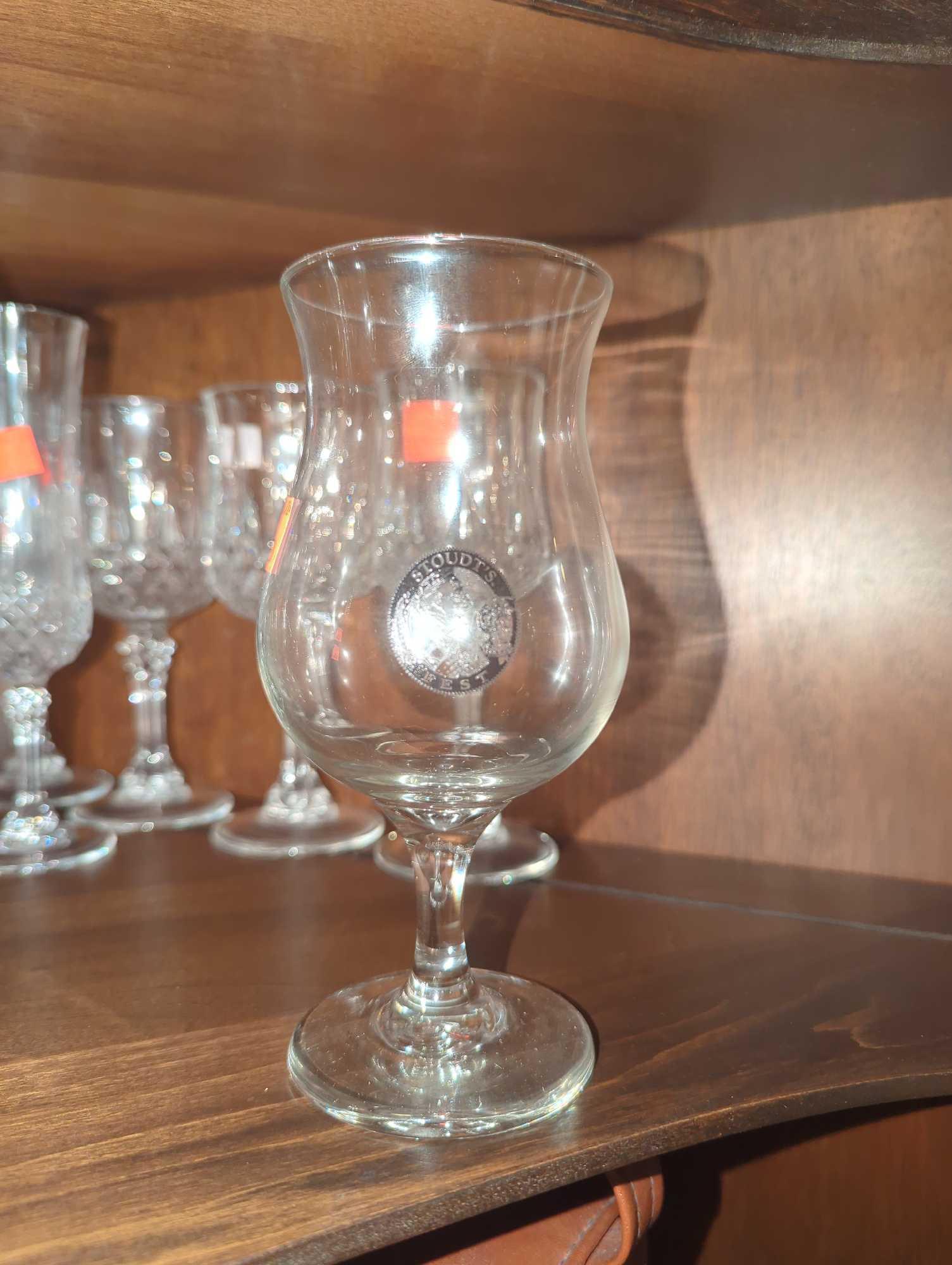 Shelf Lot of Assorted Glasses Including Wine Glasses, Beer Mugs, Tulip Glasses, Etc...What You See