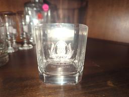 Partial Shelf Lot of Assorted Items Including Glass Whiskey Decanter, Berentzen Schnapps Shot Glass,