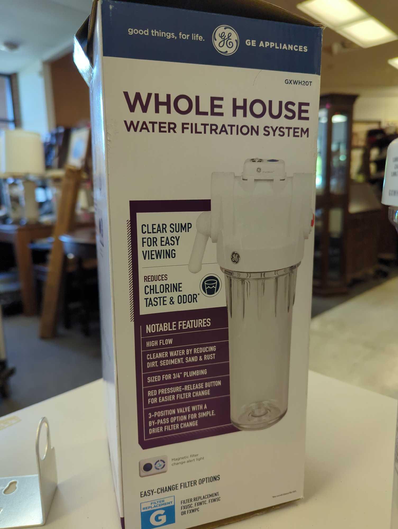 GE Whole House Water Filtration System. Comes an open box as is shown in photos. Appears to be new.